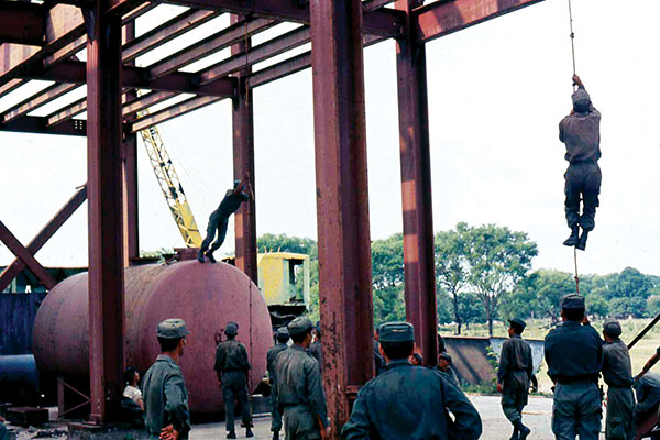 The SF team set up an obstacle course using storage tanks in the sugar mill.