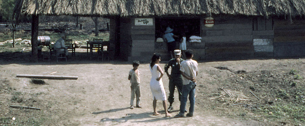 MSG Oliverio Gomez talks with some of the La Esperanza residents