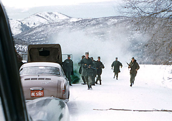 Left-Smoke grenades “disabled” convoy vehicles during an ambush on 12 February 1960.