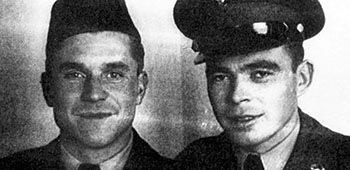 Private *John F. Gordon from Balice, Poland and another Lodge Act soldier posed for this photograph in their new U.S. Army uniforms.