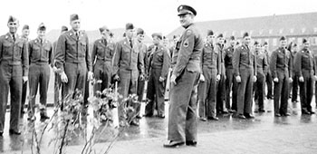 SFC Henry M. Koefoot assembles the Lodge Act enlistees in the quadrangle at Sonthofen, Germany.