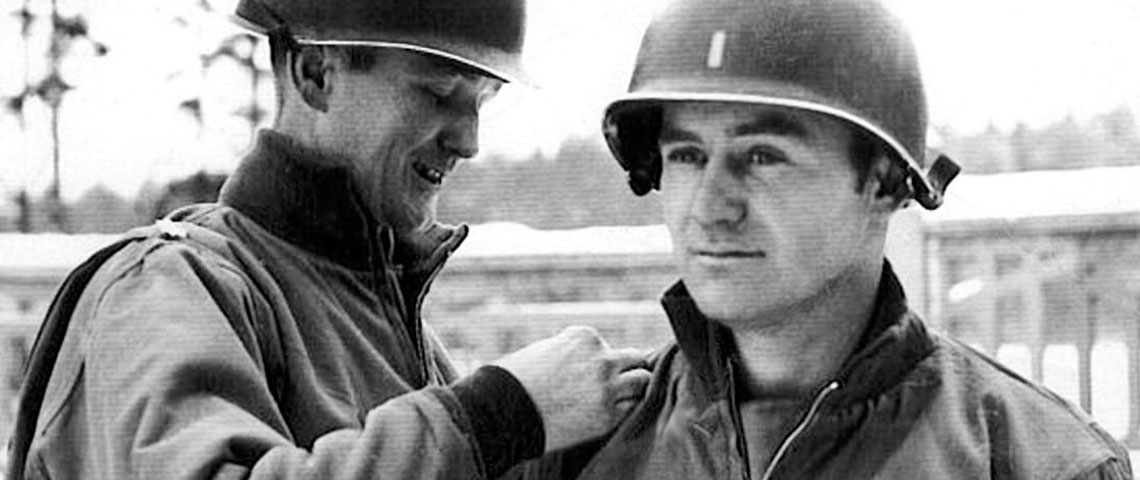 LTC Richard P. Sullivan promotes Dog Company 1SG Raymond M. Herlihy to 2nd LT in January 1945, somewhere in Germany. Sullivan would command the 5th Rangers for ten of its eleven months in combat.