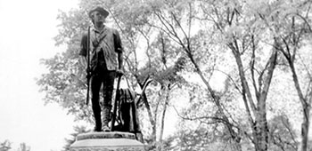 A group of Lodge Act soldiers visit the Minuteman statue in Concord, MA.