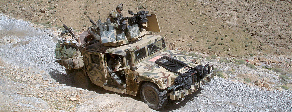 ODA 3125, B Company, 1st Battalion, 3rd Special Forces Group on the move in the countryside near Deh Rawod. The team was on its second consecutive rotation to this former Taliban stronghold.