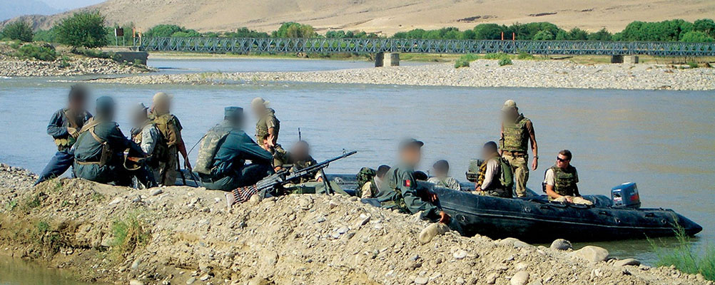 Loading the ANA and ANP troops before departing on the assault up the Helmand River. The Dutch provided the large inflatable bridge boats used on the operation. The Dutch engineers (in soft caps) supervised the loading.