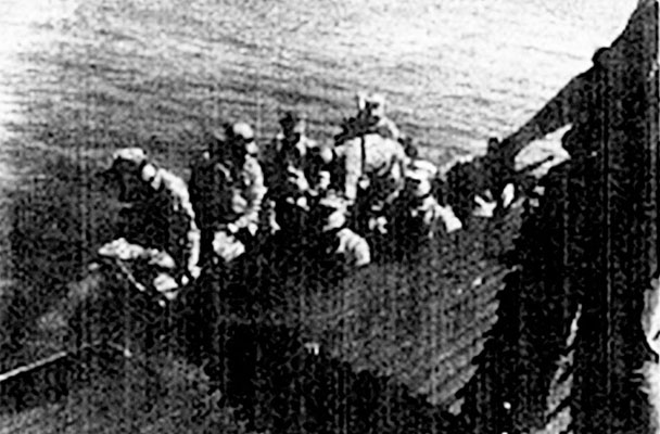 GHQ Raiders board rubber boats from the ASSP-313 Perch for another training exercise.