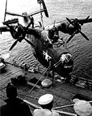 The PBM-5 Mariner nicknamed &ldquo;Hotogo,&rdquo; Fleet Air Wing Six, is hoisted aboard the seaplane tender, USS Curtiss (AV-4), following the destruction of nineteen mines off Chinnamp&rsquo;o, 8 November 1950.