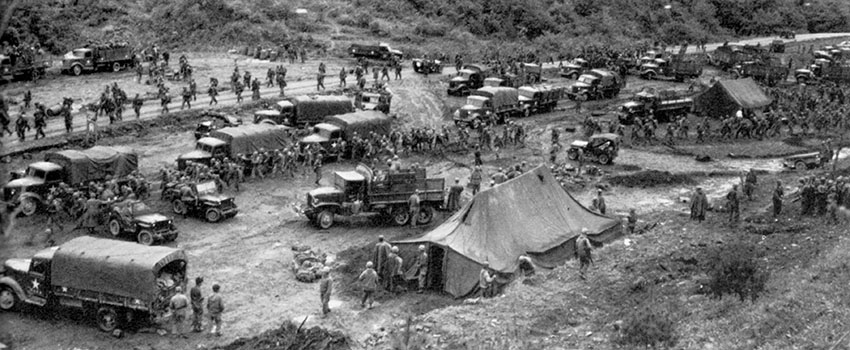 Typical assembly area in and around 2nd ID forward command post.