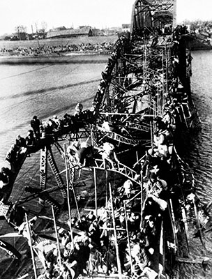 The impending Chinese invasion sent millions of North Koreans south. Refugees from P&rsquo;yongyang streamed across the remains of the Taedong River Railroad Bridge, climbing twisted girders and balancing on broken railroad ties.