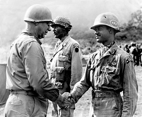 2nd Rangers painted gold and silver parachute wings on the sides of their helmets