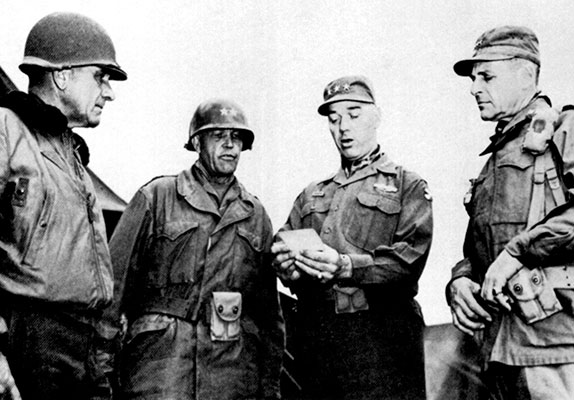 Major General William M. Hoge, Commanding General IX Corps, Major General Blackshear M. Bryan, Commanding General 24th Division, and Lieutenant General James A. Van Fleet, Commanding General U.S. Eighth Army meet with General Matthew B. Ridgway, Commander-in-Chief, Far East Command.