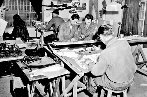 Propaganda Platoon illustrators did their work in the G-3 Psywar Section of EUSAK headquarters. Enemy uniforms, equipment, and arms were used as props.