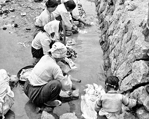 The houseboys arranged to have local laundresses wash and press uniforms