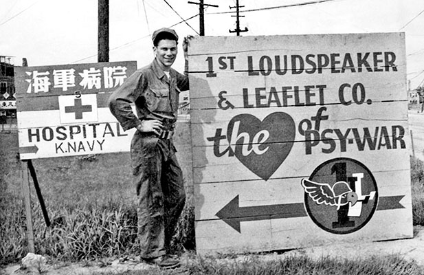 1st L&L road sign at the main intersection