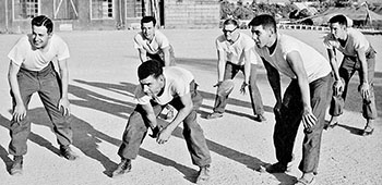 A &ldquo;pick-up&rdquo; game of touch football in the motor pool.