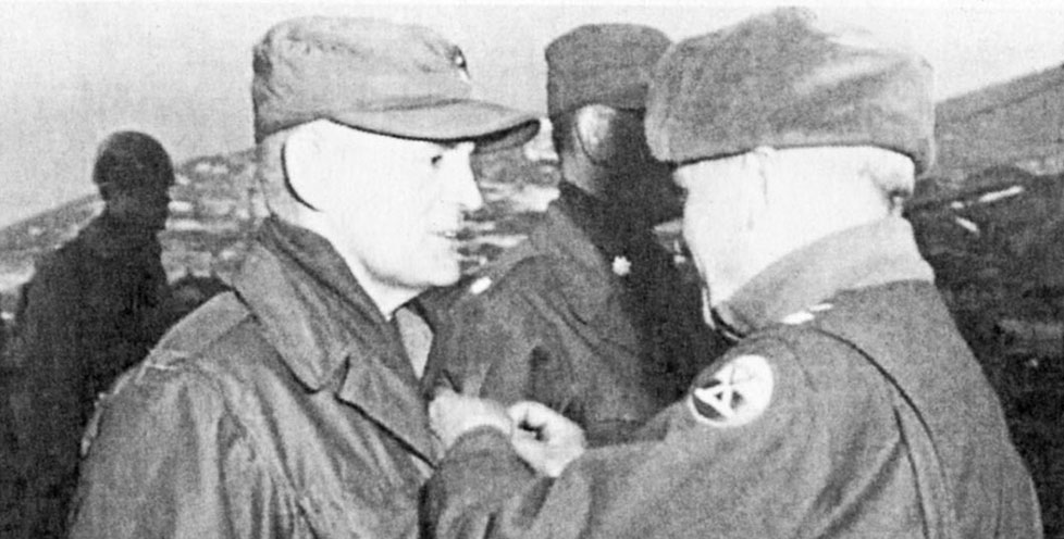 MG Edward M. Almond awards Legion of Merit to USMC COL Edward H. Forney at Hungnam on 14 December 1950.