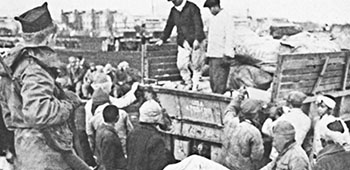 North Korean refugees volunteered to unload trucks to speed up the evacuation.