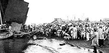 North Korean refugees waited apprehensively to board U.S. Navy LST 845 at Hungnam.