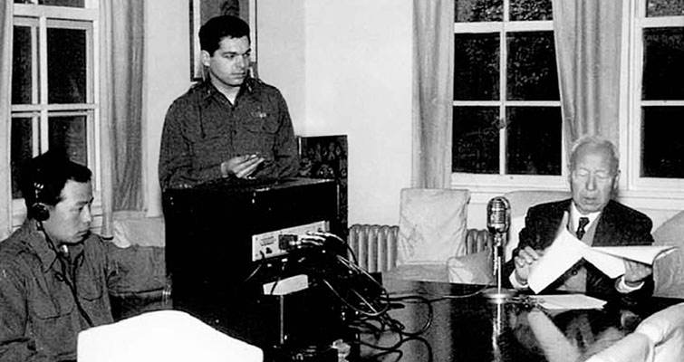 South Korean President Syngman Rhee (in front of the microphone) records a speech for the Korean Broadcast System (KBS).