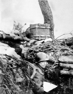 Working from the trenches, Zayac starkly rendered the realities of war. The box with carrying straps is a portable loudspeaker.