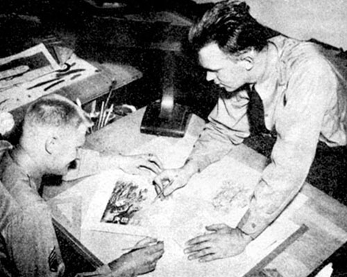 SSG John A. Davenport and SGT Gudmund Berge of the 1st RB&L Leaflet Section