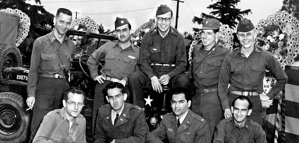 Visiting officers of the 1st RB&L pose with 4th MRBC personnel following the official opening ceremony for Radio Taegu.