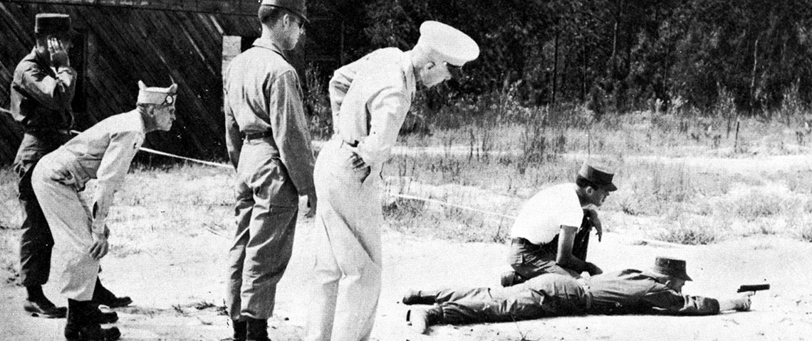 MAJ John D. Striegel, COL Aaron Bank, CPT Dorsey B. Anderson, and COL Charles H. Karlstad observe 10th SFG training at Fort Bragg, NC, 1952.