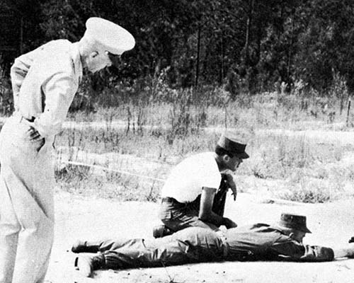 MAJ John D. Striegel, COL Aaron Bank, CPT Dorsey B. Anderson, and COL Charles H. Karlstad observe 10th SFG training at Fort Bragg, NC, 1952.