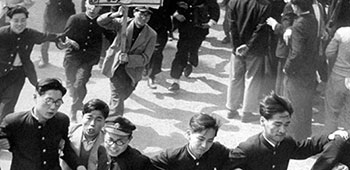 Student and labor union members carrying protest banners continued their snake-dance into the Imperial Plaza during the May Day riot.