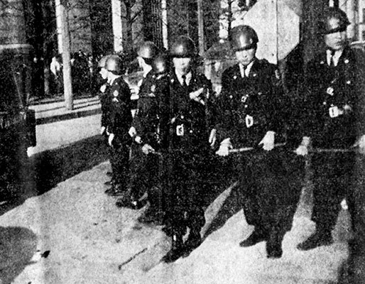 Police positioned outside the Dai Ichi (Number One) Building, the Far East Command (FECOM) headquarters of General Matthew B. Ridgway.