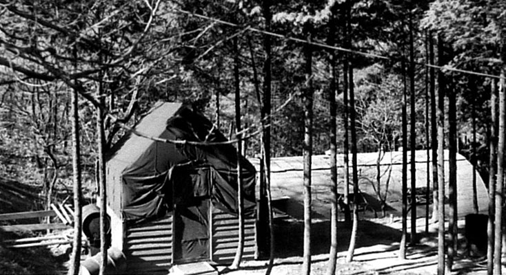 The 4th MRBC Radio Pusan detachment, initially co-located at the Korean radio station compound, lived in &lsquo;Paradise Pines.&rsquo; The officers had a tent covered shelter and the soldiers lived in the Quonset hut behind.