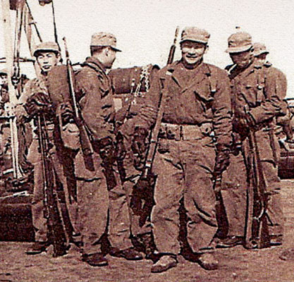 CIA Korean SMG aboard U.S. Navy ship for raid mission.