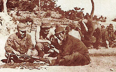 SMG trainees learn assembly and disassembly of Browning Automatic Rifles (BAR) under U.S. supervision on Yong-do.
