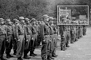 The wooden structure in the right rear of the left side of the formation is a makeshift jump platform built by SFC James C. Pagnella for ground training.