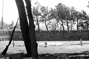 “CPT Hilary H. ‘Hunt’ Crawford, a WWII OSS veteran, approved the construction of a 1,000 inch ‘zero range’ and a 250 yard rifle range with double sandbagged backstops. USMC 1LT Thomas L. Curtis and I taught .45 cal. pistol marksmanship on Point #3 of the 1,000 inch range.”