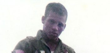 Private Tyrone J. Adderly holding the M1918 Browning Automatic Rifle (BAR), a .30-06 Squad Automatic Weapon used until the Vietnam War.