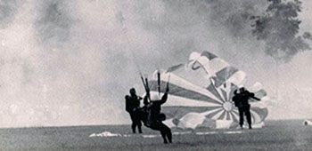 While with 8th Special Forces Group in Panama, Fry organized a Free Fall Demonstration Team that was known as the ‘Jumping Ambassadors’ throughout Latin America. This photo is of a 4th of July demonstration jump in the Panama Canal Zone in 1963. 