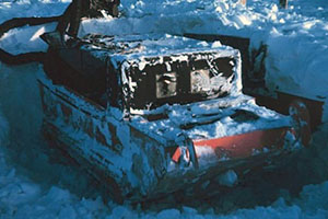 “Digging out a weasel – not a fun job when it’s 40 degrees below zero.” Alaska, Barter Island, North Slope. Spring, 1949.